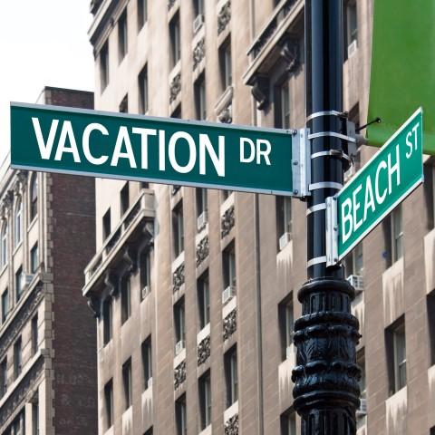 שלט vacation בפינת רחוב בניו יורק - גרפיקסטוק